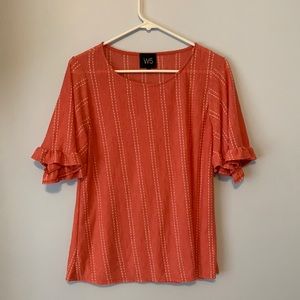 Salmon colored nice top with white dots, Size M